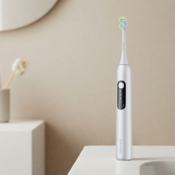 Szczoteczka SpinelCare SmileOn White + 2 białe końcówki